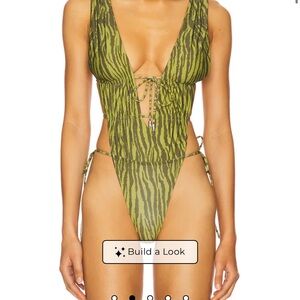 Heart Of Gold Skimpy Printed Deep V Open Back Bodysuit in Ganja
Indah